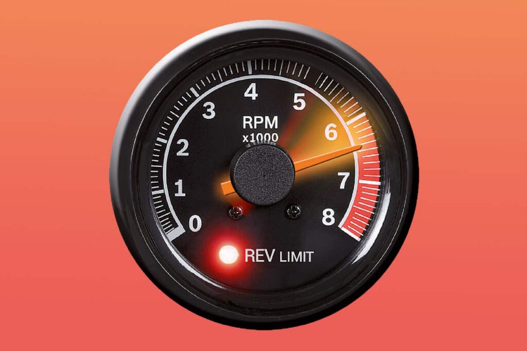 Rupteur d'allumage avec vis platinées et condensateur sur un moteur ancien